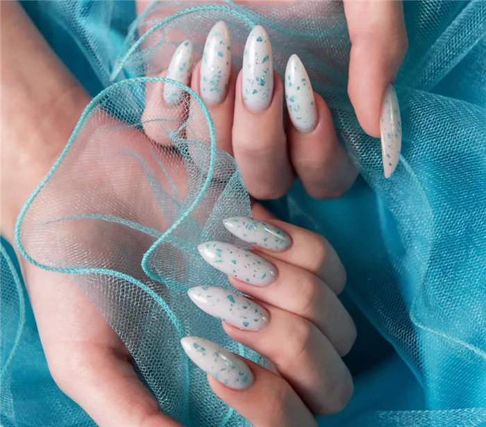 female-hands-with-blue-nail-design-blue-nail-polish-manicure.jpg